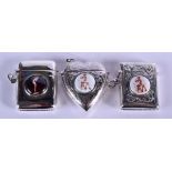 THREE ENGRAVED SILVER VESTA CASES. (3)