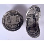 TWO CHINESE WHITE METAL INGOTS, varying form, weight 434 grams. Largest 7.5 cm wide.