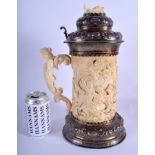 A LARGE 18TH/19TH CENTURY CONTINENTAL CARVED IVORY TANKARD STEIN decorated in relief with classical