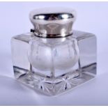 AN EDWARDIAN SILVER AND GLASS INKWELL. London 1908. 11 cm x 9 cm.