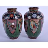 A PAIR OF LATE 19TH CENTURY JAPANESE MEIJI PERIOD CLOISONNE ENAMEL VASES decorated with birds and fl