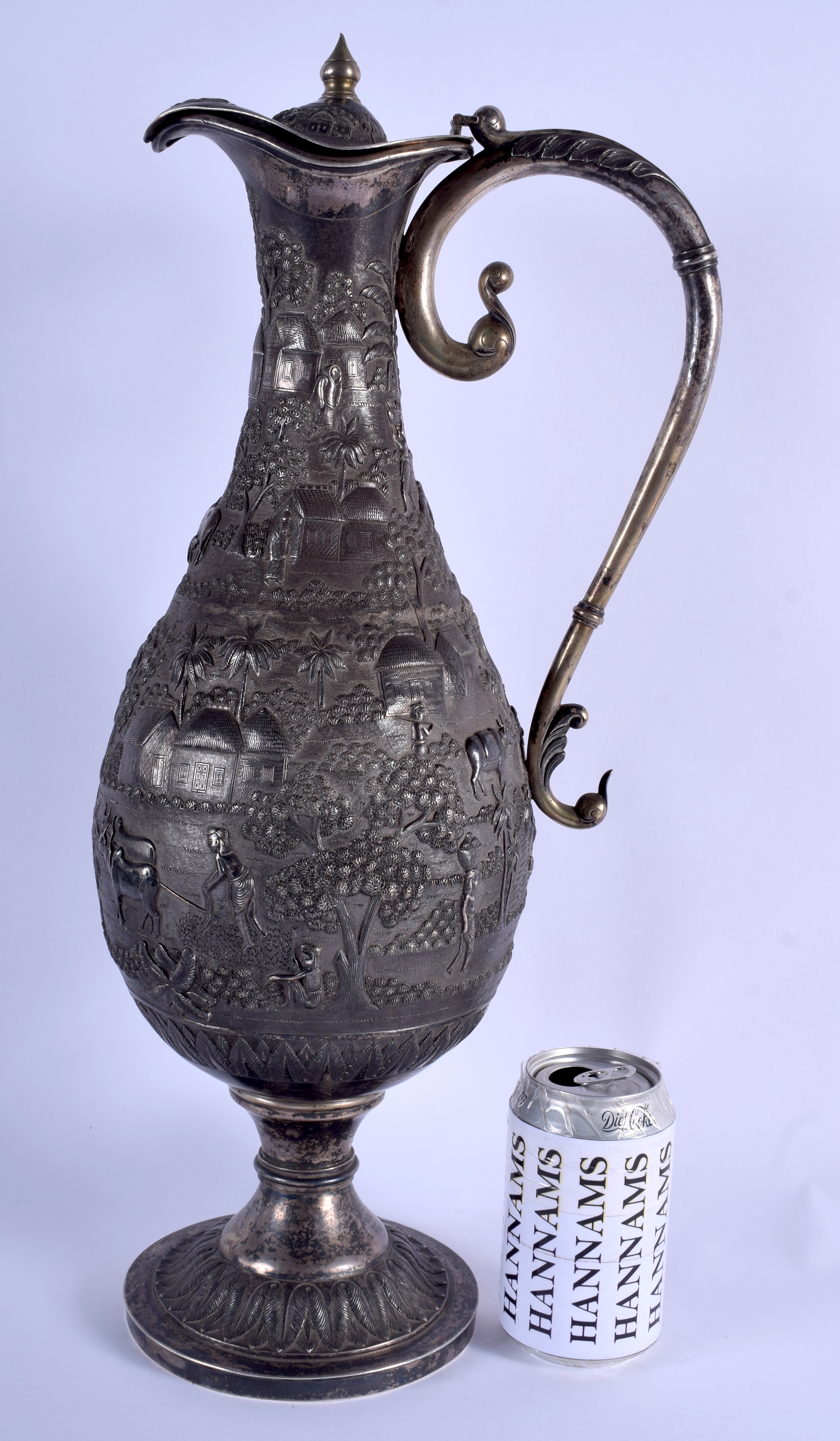 A MAJESTIC 19TH CENTURY NORTH WEST INDIAN SILVER PEDESTAL EWER possibly Bhuj & by Oomersi Mawji, of