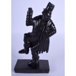 AN EARLY 20TH CENTURY CONTINENTAL EBONY FIGURE OF A DANCING MALE. 19 cm high.