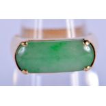 AN 18CT GOLD CHINESE APPLE JADEITE RING. 4.3 grams. L.