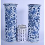 A LARGE PAIR OF 19TH CENTURY CHINESE BLUE AND WHITE VASES bearing Kangxi marks to base. 27 cm high.