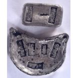 TWO CHINESE WHITE METAL INGOTS, varying form, weight 390 grams. Largest 8 cm wide.