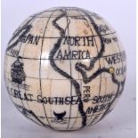 A BONE POCKET GLOBE, etched detail to body. 7 cm high.