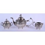 A FINE 19TH CENTURY DUTCH UTRECHT SILVER TEASET decorated with figures and trailing foliage. 37.5 oz