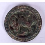 A LURISTAN BRONZE PLAQUE, depicting a male on horseback. 7.25 cm wide.