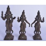 A SET OF THREE 19TH CENTURY INDIAN BRONZE BUDDHISTIC DEITY upon square bases. Largest 21.5 cm high.