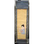 A JAPANESE WATERCOLOUR SCROLL PAINTING, depicting a seated geisha.122 cm x 38 cm.