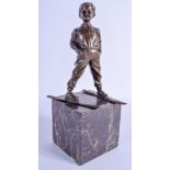 A BRONZE SKIER. 29 cm high.