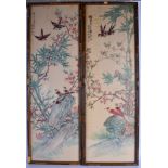 A FRAMED PAIR OF CHINESE PRINTS, depicting birds in foliage. 95 cm x 29.5 cm.