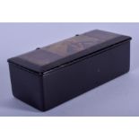 A MID VICTORIAN BLACK PAPIER MACHE SNUFF BOX. 9.25 cm x 4.25 cm.