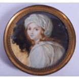 A 19TH CENTURY CONTINENTAL PAINTED IVORY PORTRAIT MINIATURE. Image 6 cm x 6 cm.