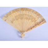 A LARGE FINE 19TH CENTURY EUROPEAN DIEPPE IVORY FAN carved with putti playing an instrument amongst