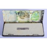 A VINTAGE WINDSOR & NEWTONS ARTIST TRAVELLING TIN PAINT BOX. 13 cm wide.