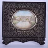 A 19TH CENTURY INDIAN PAINTED IVORY PORTRAIT MINIATURE within a hardwood frame. Image 6.5 cm x 5.25