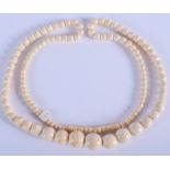 TWO ANTIQUE IVORY NECKLACES. 45 grams. (2)