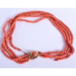 AN 18CT GOLD MOUNTED CHINESE CORAL NECKLACE 70 grams. 34 cm long.