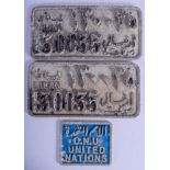 FOUR UNUSUAL MIDDLE EASTERN CAST IRON NUMBER PLATES. (3)