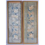 A FRAMED PAIR OF CHINESE SILK PANELS, depicting bats amongst fruiting vines. 50 cm x 16 cm.