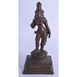 A 19TH CENTURY INDIAN BRONZE FIGURE OF A DEITY. 12 cm x 5 cm.