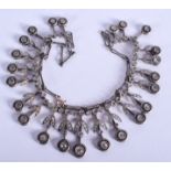 AN OTTOMAN 18CT GOLD AND WHITE METAL DIAMOND NECKLACE. 44 cm long.