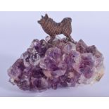 A 1920S AUSTRIAN COLD PAINTED BRONZE AND AMETHYST DOG. 11 cm x 8 cm.