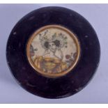 AN ANTIQUE CARVED WOOD SNUFF BOX. 7 cm wide.