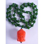 A CHINESE CORAL AND JADEITE NECKLACE. Jadeite 60 cm long.