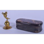 A LATE REGENCY HORN AND TORTOISESHELL SNUFF BOX together with a brass weight. (2)