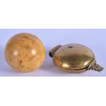 AN ANTIQUE IVORY BALL together with a bronze beetle nut box. (2)