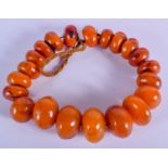 A CHUNKY AMBER NECKLACE. 40 cm long.