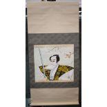 A JAPANESE WATERCOLOUR SCROLL PAINTING, depicting a male with a book in his mouth. 43 cm x 51 cm.