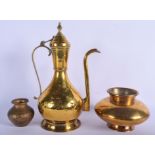 A LARGE ANTIQUE INDIAN PERSIAN BRASS EWER together with two other vessels. (3)