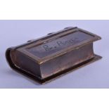 AN ANTIQUE BRASS BOOK SNUFF BOX. 5.75 cm x 3.5 cm.