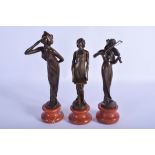 THREE BRONZE MAIDENS. 23 cm high. (3)