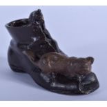 A COLD PAINTED BRONZE SHOE. 9 cm x 5 cm.