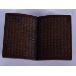 A JAPANESE BRONZE BOOK. 6 cm x 4.5 cm.