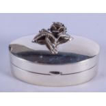 A SILVER ROSE PILL BOX. 3.5 cm wide.