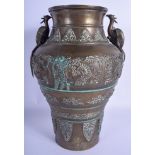 A 19TH CENTURY JAPANESE MEIJI PERIOD TWIN HANDLED BRONZE VASE decorated with birds and foliage. 30