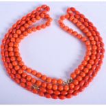 TWO CORAL NECKLACES. 60 cm long. (2)