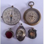 THREE VINTAGE COMPASS and two fobs. (5)