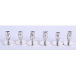 A SET OF SIX SILVER OWL MENU HOLDERS. 2.5 cm high. (6)