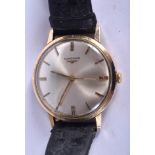 A 9CT GOLD LONGINES WRISTWATCH. 3.25 cm diameter.