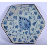 A 16TH/17TH CENTURY SAFAVID TIMURID PAINTED BLUE POTTERY TILE Persia, painted with flowers. 18 cm w