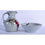 A STUDIO POTTERY JUG AND BASIN by David Eeles. Jug 24 cm x 13 cm. (2)