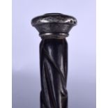 AN EBONY SILVER TOP WALKING CANE, incised with floral decoration. 82 cm long.