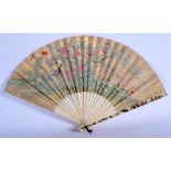 A FINE 19TH CENTURY JAPANESE MEIJI PERIOD SHIBAYAMA IVORY FAN wonderfully painted with birds amongs